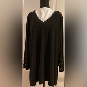 Slim Factor black knit, v neck tunic with grommets on long sleeves.